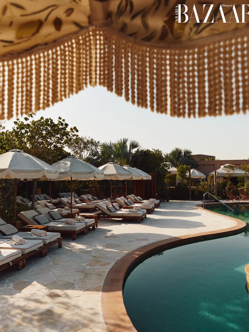 The pool and private beach at Gigi Rigolatto