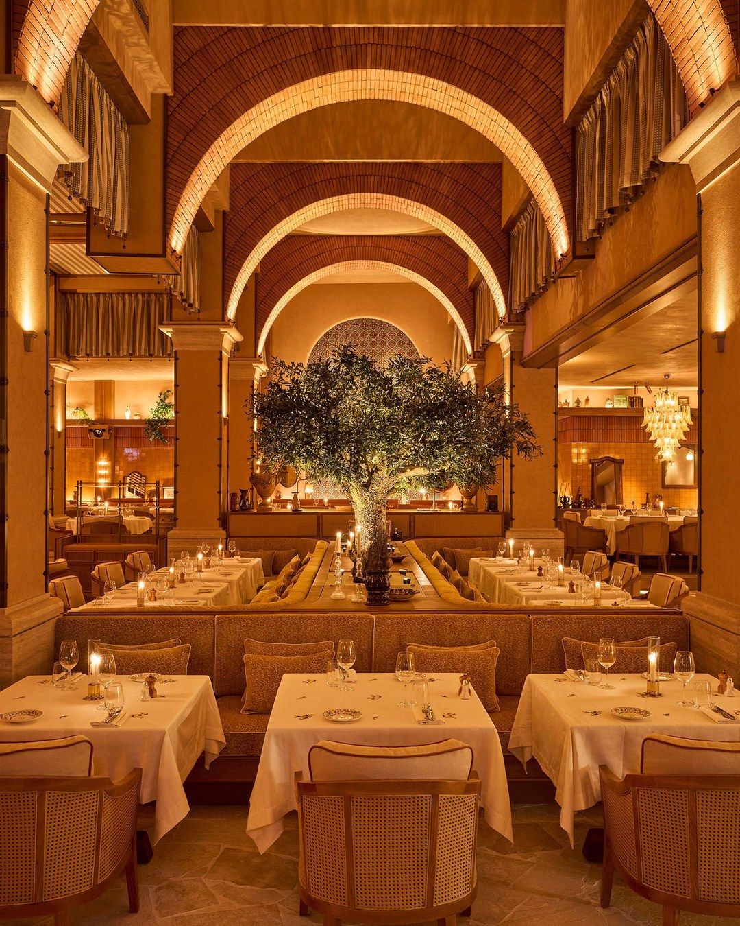 The great arch and olive tree in the Gigi Rigolatto dining room