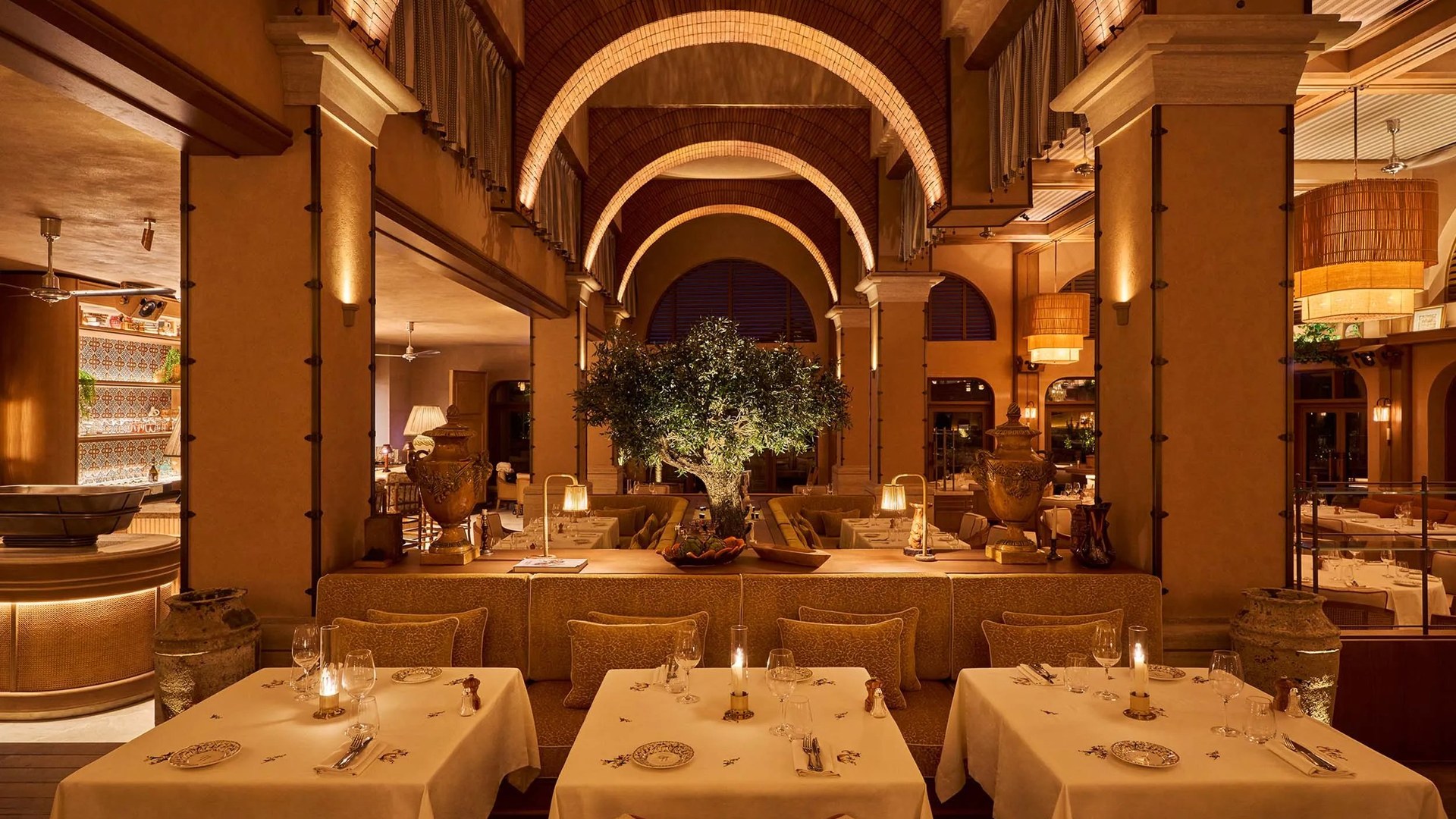The great arch and olive tree in the Gigi Rigolatto dining room